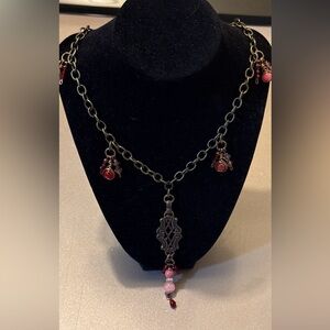 One of a kind upcycled statement necklace made with a vintage 1970s belt